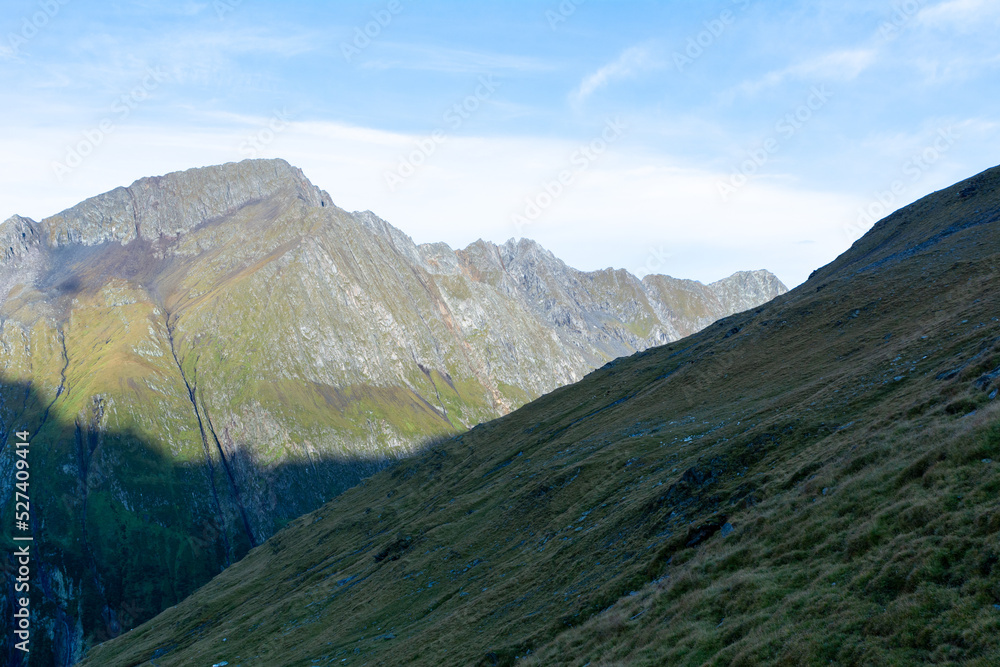 Impressive alpine view of high peaks in summer Impressive alpine view of high peaks in summer