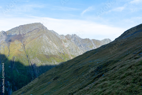 Impressive alpine view of high peaks in summer