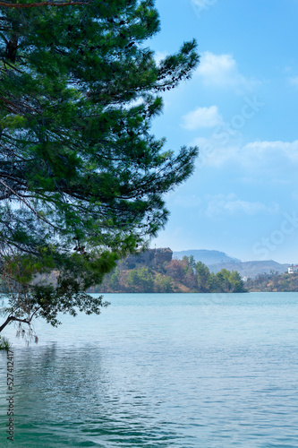 Natural beauty of Turkey. Mountains, green pines, turquoise lake. Mountain landscape with forest, trees. Beautiful mountain lake backround. Rocks