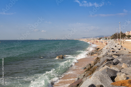 beach image of a sunny day in El Masnou, Maresme Barcelona, vacations, relax, Mediterranean. photo