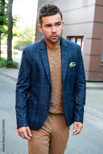 Young man posing in trendy autumn clothes
