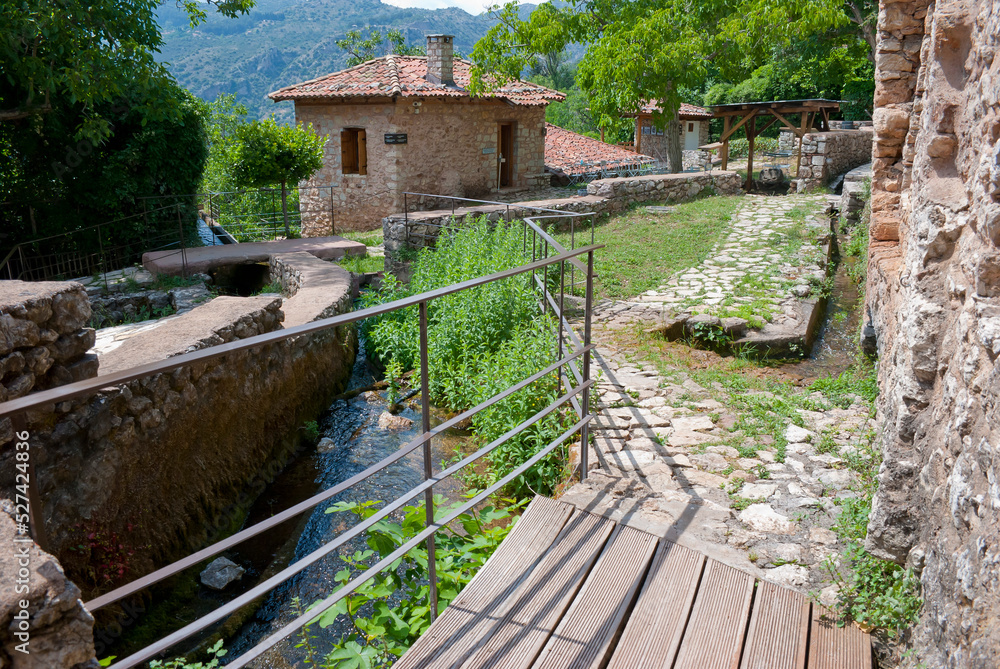 Dimitsana, Greece / July 2022: The Open-Air Water Power Museum and Village near Loussios Gorge Dimitsana, Greece / July 2022: The Open-Air Water Power Museum and Village near Loussios Gorge