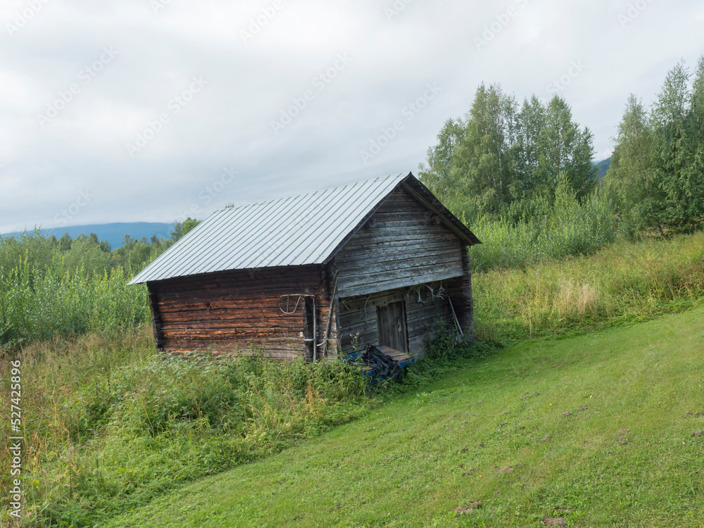 Small log cabin, wooden house in Kvikkokk at northern Sweden Lapland