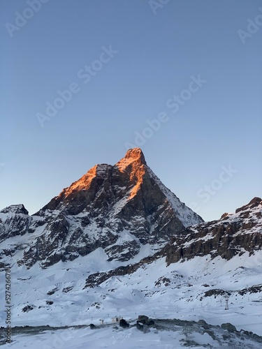 Snow covered mountain (Matterhorn) at sunset