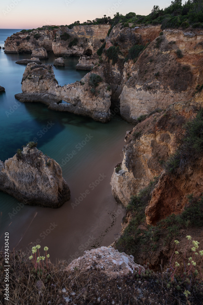 cliffs in the Algarve region of Portugal. Rock formations and sea cliffs in the Algarve region of Portugal. Rock formations and sea