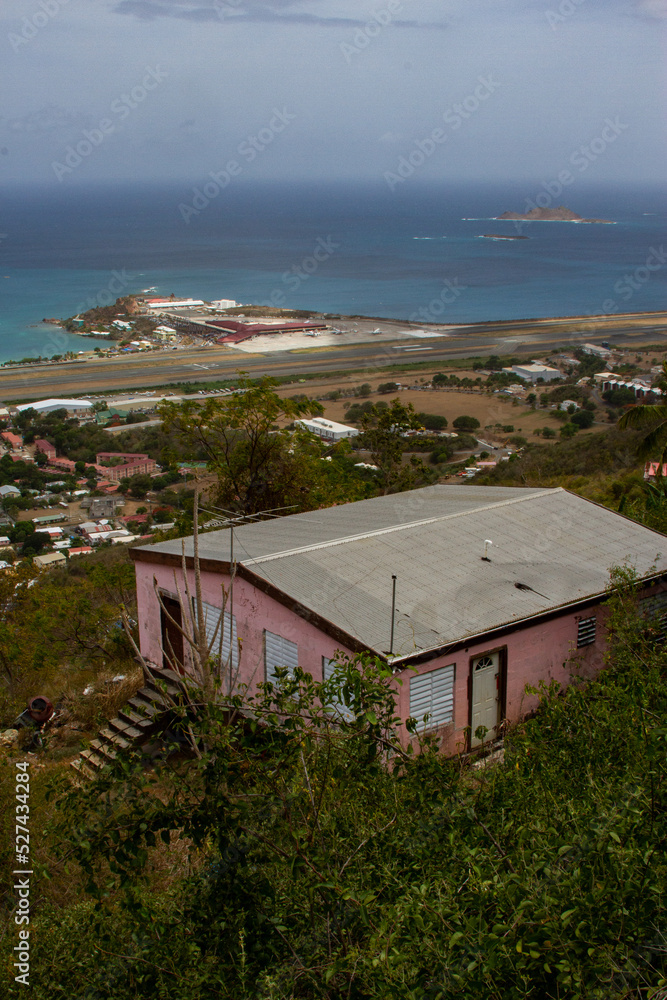 House on Cliff over virgin island airport 