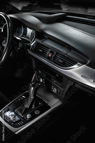 Close-up of air vent in car. Dashboard in modern car interior. © kucheruk