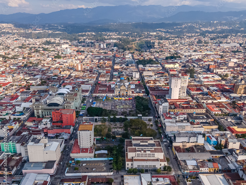 Fototapeta premium Beautiful aerial view of Guatemala City - Catedral Metropolitana de Santiago de Guatemala, the Constitution Plaza in Guatemala