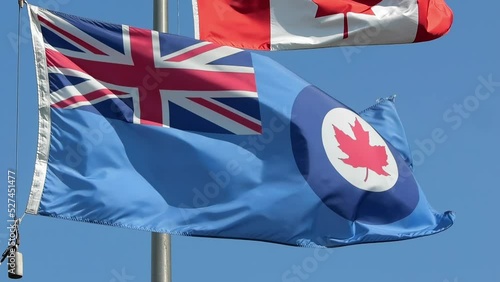 A waving Royal Canadian Air Force flag during sunny day. photo