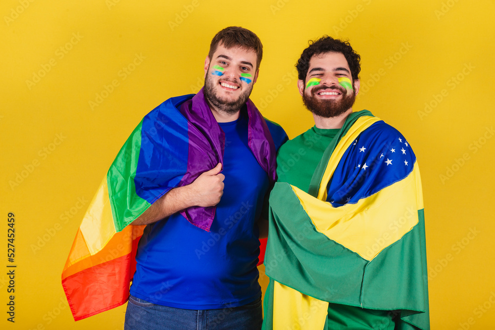 couple of men, brazilian, soccer fans from brazil, wearing LGBT flag,.concept of diversity