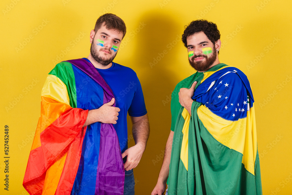 men, brazilians, soccer fans from brazil, wearing LGBT flag,.concept of