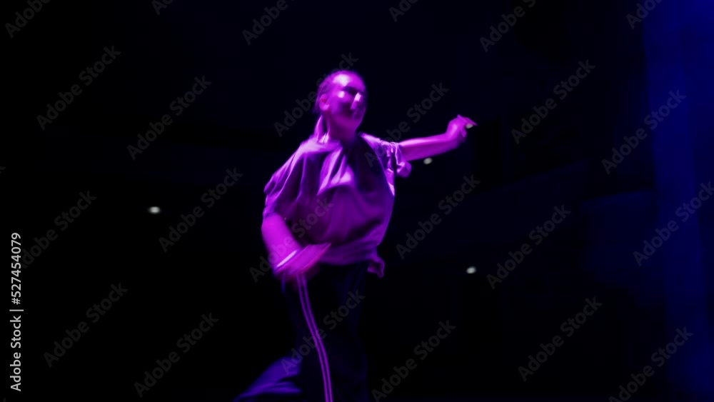 active teen girl is dancing hip hop choreography on stage, dance show and performance active teen girl is dancing hip hop choreography on stage, dance show and performance