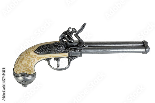 A replica of a 17th century triple barrel flintlock pistol with an engraved ivory handle photo