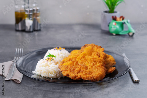 Photography Fried Chops With Steamed Rice, Wiener Schnitzel in the hotel restaurant