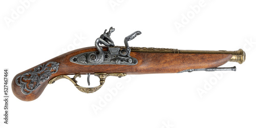 18th or 19th century wooden flintlock pistol replica lying on it's side