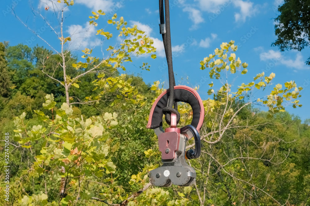 Heavyduty zip line pulley and slider StockFoto Adobe Stock
