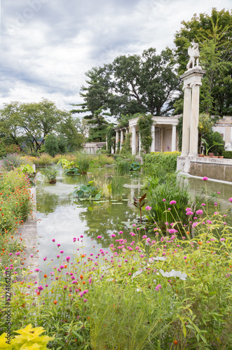 Beautiful gardens and fountains inside the walled garden at Untermyer Park in Yonkers, NY photo