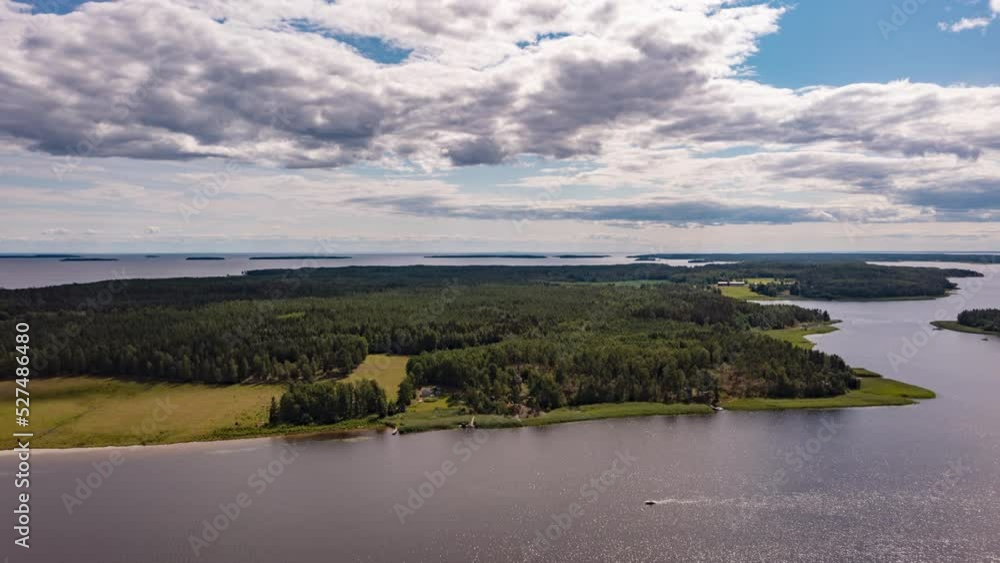 Hyperlapse of clouds moving over islands on lake Vanern, summer in partly sunny Sweden Hyperlapse of clouds moving over islands on lake Vanern, summer in partly sunny Sweden