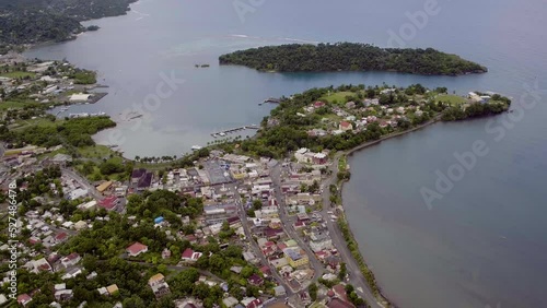 Aerial view from Navy Island to Port Antonio town revealing the west harbour on a calm morning photo