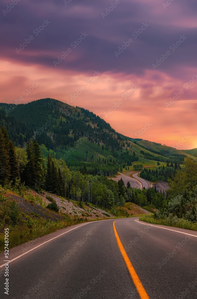 Road Through The Mountains At Sunrise