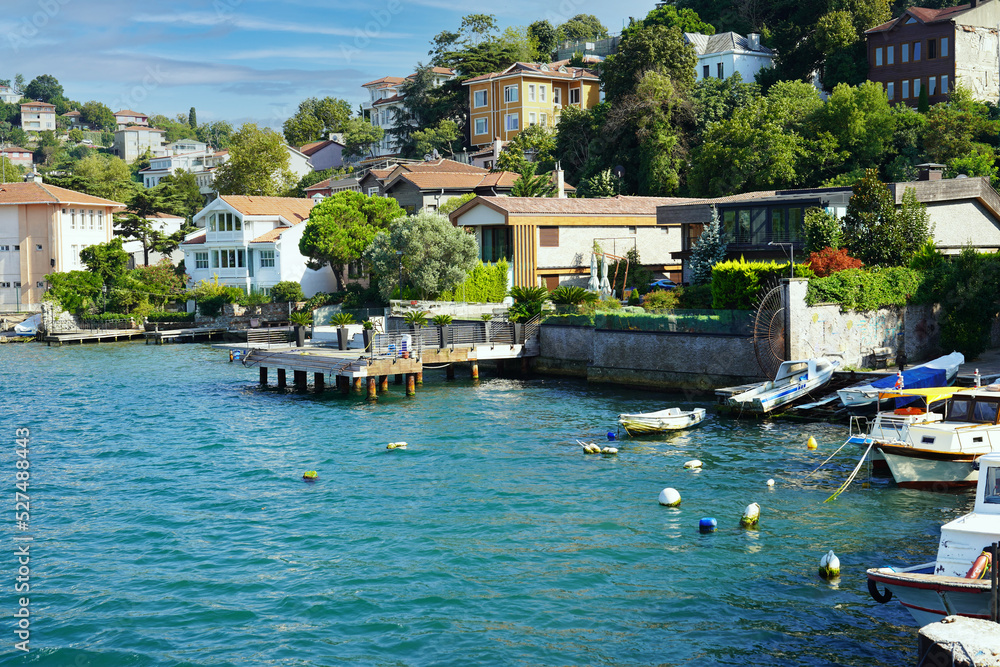 Fototapeta premium Views of various houses, (home) mansions and nostalgic buildings from the sea on the Bosphorus, on the Asia side of Istanbul. residence by the sea.