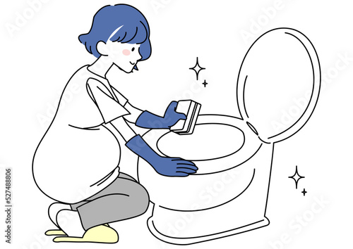 トイレ掃除をする妊婦