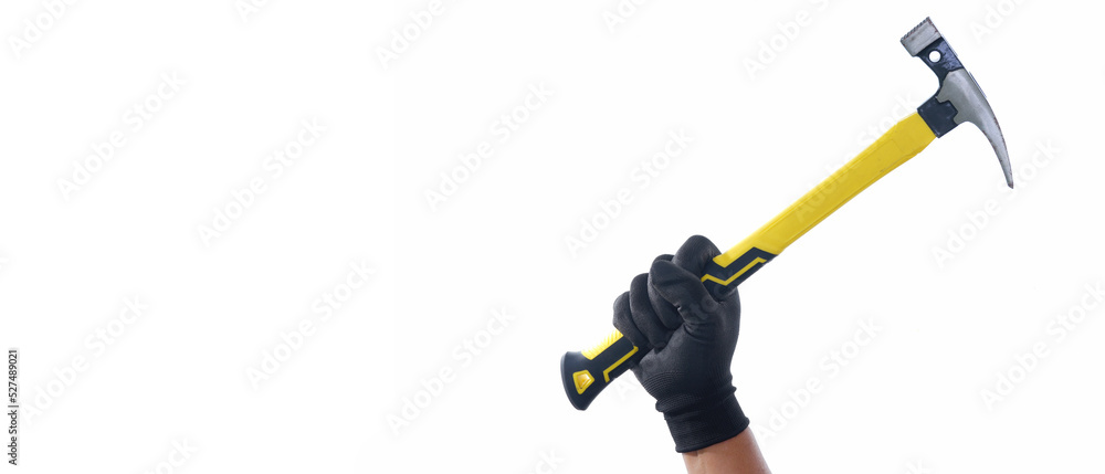 Hand wearing black gloves holding yellow black long claw hammer ...