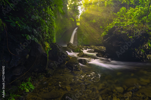 Indonesian scenery at the waterfall on a sunny morning
