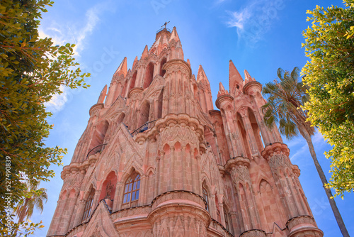 old religious building of san miguel de allende, catholic temple during the day, landmark photo