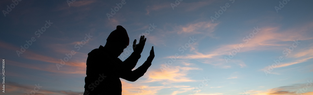The human hand raises his palm open to worship. Eucharist, bless the Lord, help Catholics repent of Easter. behind the concept of Christianity Battle and Victory for God The human hand raises his palm open to worship. Eucharist, bless the Lord, help Catholics repent of Easter. behind the concept of Christianity Battle and Victory for God