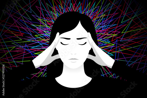 Woman is touching her temples with hands, concept of mental health