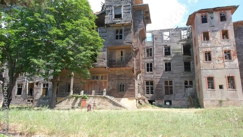 4k Video of biggest wooden made abandoned and brownfield building of Orphanage local name is Rum Yetimhanesi in Buyukada istanbul photo