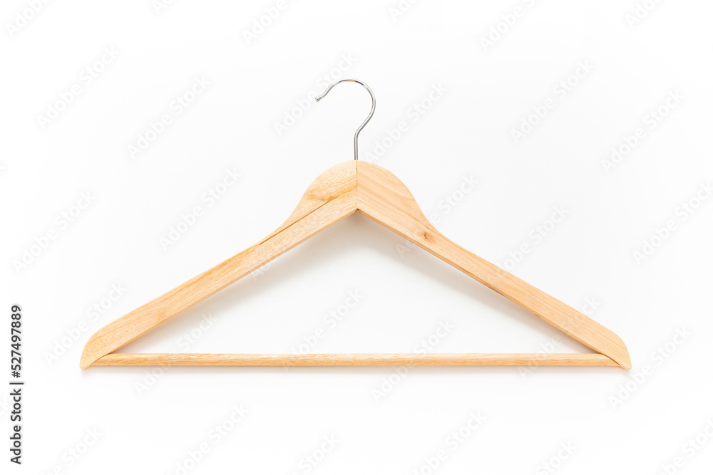 Clothes hanger isolated on white background. Wooden clothes hanger. Wood surface. Scandinavian design. Household item. Home decoration. Daily use. Simplicity. Clothes hanger isolated on white background. Wooden clothes hanger. Wood surface. Scandinavian design. Household item. Home decoration. Daily use. Simplicity.