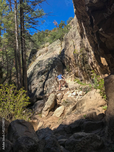 man hiking in the mountains of Santa Fe