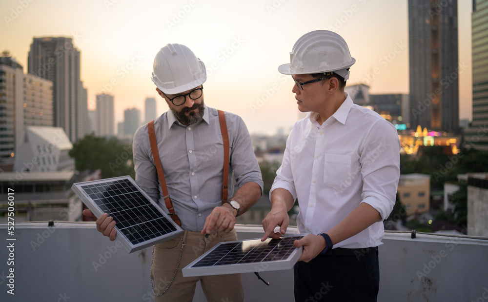 People working in Engineering Technology.Solar Energy Trading Industry Maintenance Contractor.Technicians work as a blueprint equipment construction team. People working in Engineering Technology.Solar Energy Trading Industry Maintenance Contractor.Technicians work as a blueprint equipment construction team.