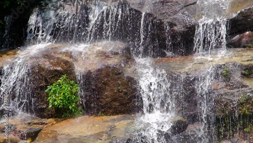 Wallpaper Mural Waterfall slow motion footage, flowing water stream in a tropical rainforest in Thailand.  Torontodigital.ca