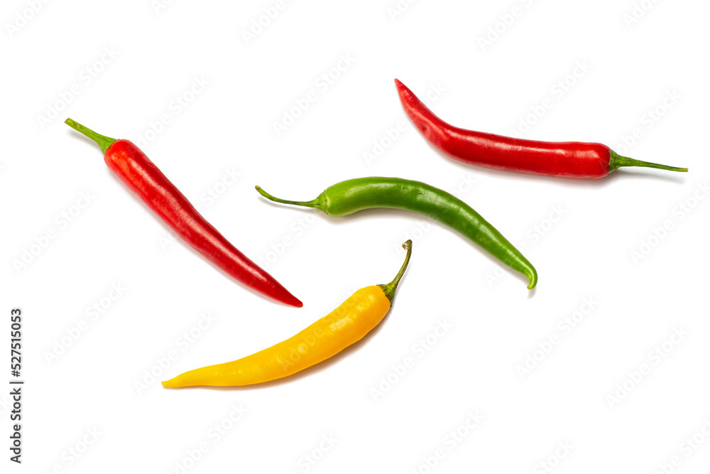 four hot peppers, red, green and yellow,  isolated