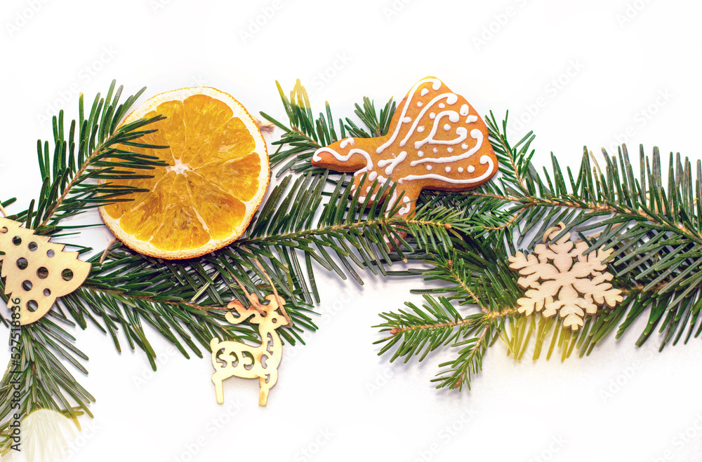 natural fir tree pine cone green grass in middle with some decoration.gingerbread angel cookie,wooden eco toys snowflake deer shape,dry orange slice.christmas background,winter natural fir tree pine cone green grass in middle with some decoration.gingerbread angel cookie,wooden eco toys snowflake deer shape,dry orange slice.christmas background,winter