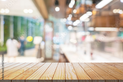 Wallpaper Mural Blurred cafe or coffee shop background with wood table top. Torontodigital.ca