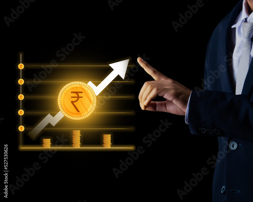 Businessman touching finance graph with rupee sign, good credit score, associated bank, investment and business background photo