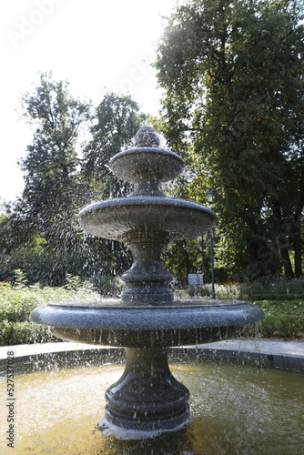 Small beautiful fountain on a summer day