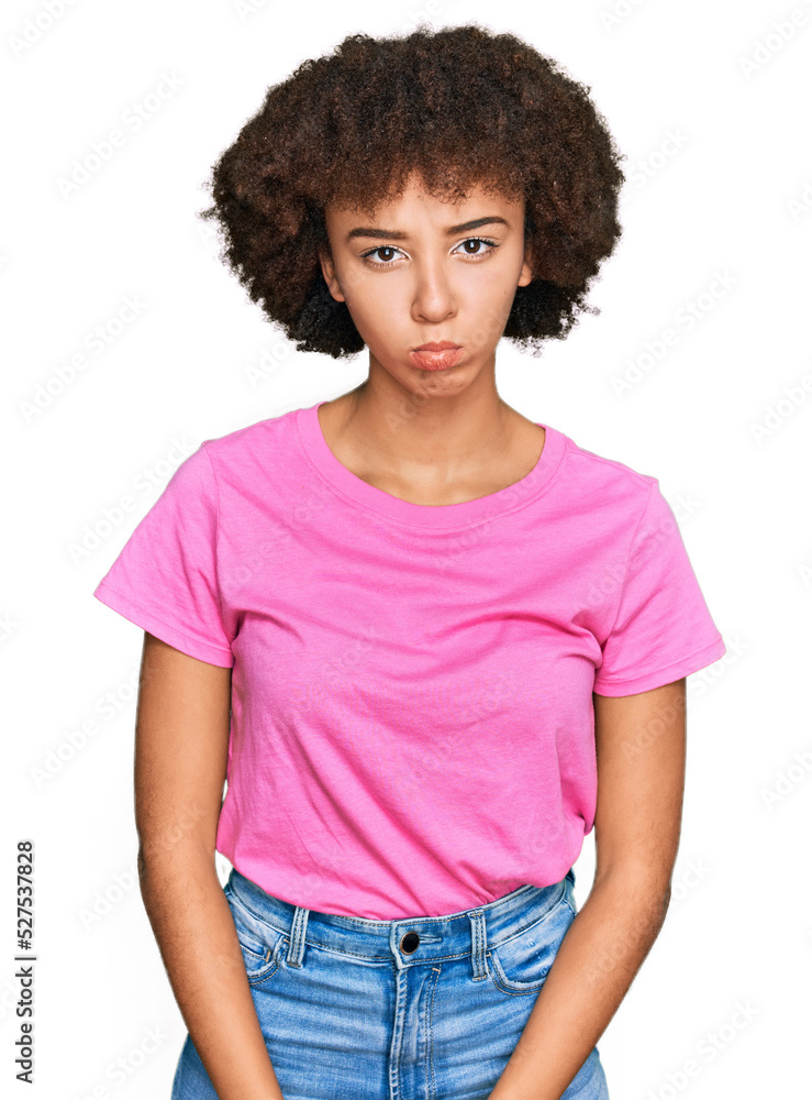 Young hispanic girl wearing casual clothes depressed and worry for distress, crying angry and afraid. sad expression. Young hispanic girl wearing casual clothes depressed and worry for distress, crying angry and afraid. sad expression.