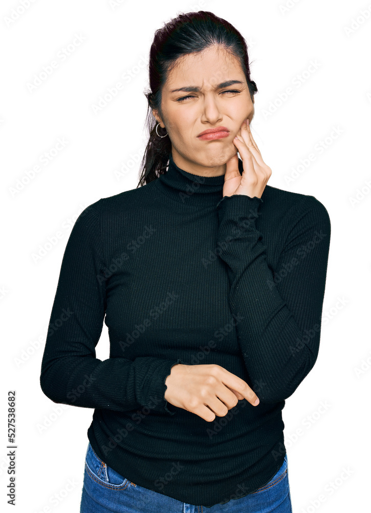 Young hispanic woman wearing casual clothes touching mouth with hand with painful expression because of toothache or dental illness on teeth. dentist Young hispanic woman wearing casual clothes touching mouth with hand with painful expression because of toothache or dental illness on teeth. dentist