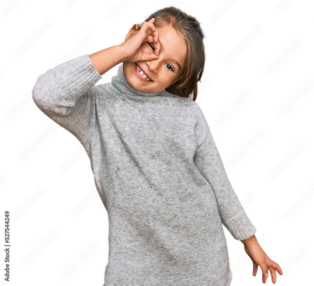 Little beautiful girl wearing casual turtleneck sweater smiling happy doing ok sign with hand on eye looking through fingers Little beautiful girl wearing casual turtleneck sweater smiling happy doing ok sign with hand on eye looking through fingers