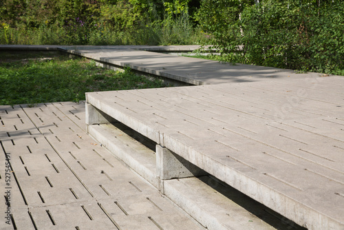 Фотография Modern garden design and landscaping: Pedestrian overpass or walkway with a plat