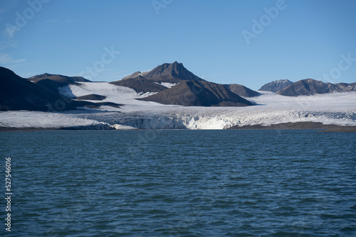 landscape view of an ice glacier in Svalbard islands, in the arctic sea