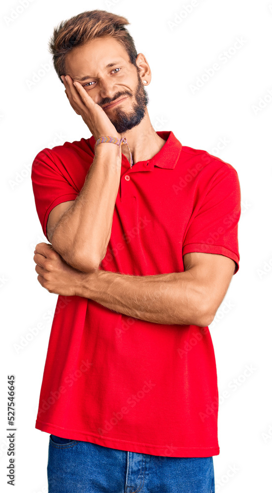 Handsome blond man with beard wearing casual clothes thinking looking tired and bored with depression problems with crossed arms. Handsome blond man with beard wearing casual clothes thinking looking tired and bored with depression problems with crossed arms.