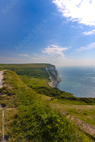 Landscape photo of White Cliffs of Dover taken from National Trust park in Southern England