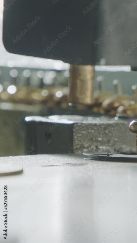 Vertical video of Advanced robotic machine manufacturing parts in an automated assembly line Vertical video of Advanced robotic machine manufacturing parts in an automated assembly line