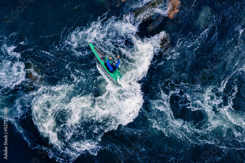 Εκτύπωση καμβά Top view kayaker on mountain rough river, extreme kayak boat, aerial drone photo